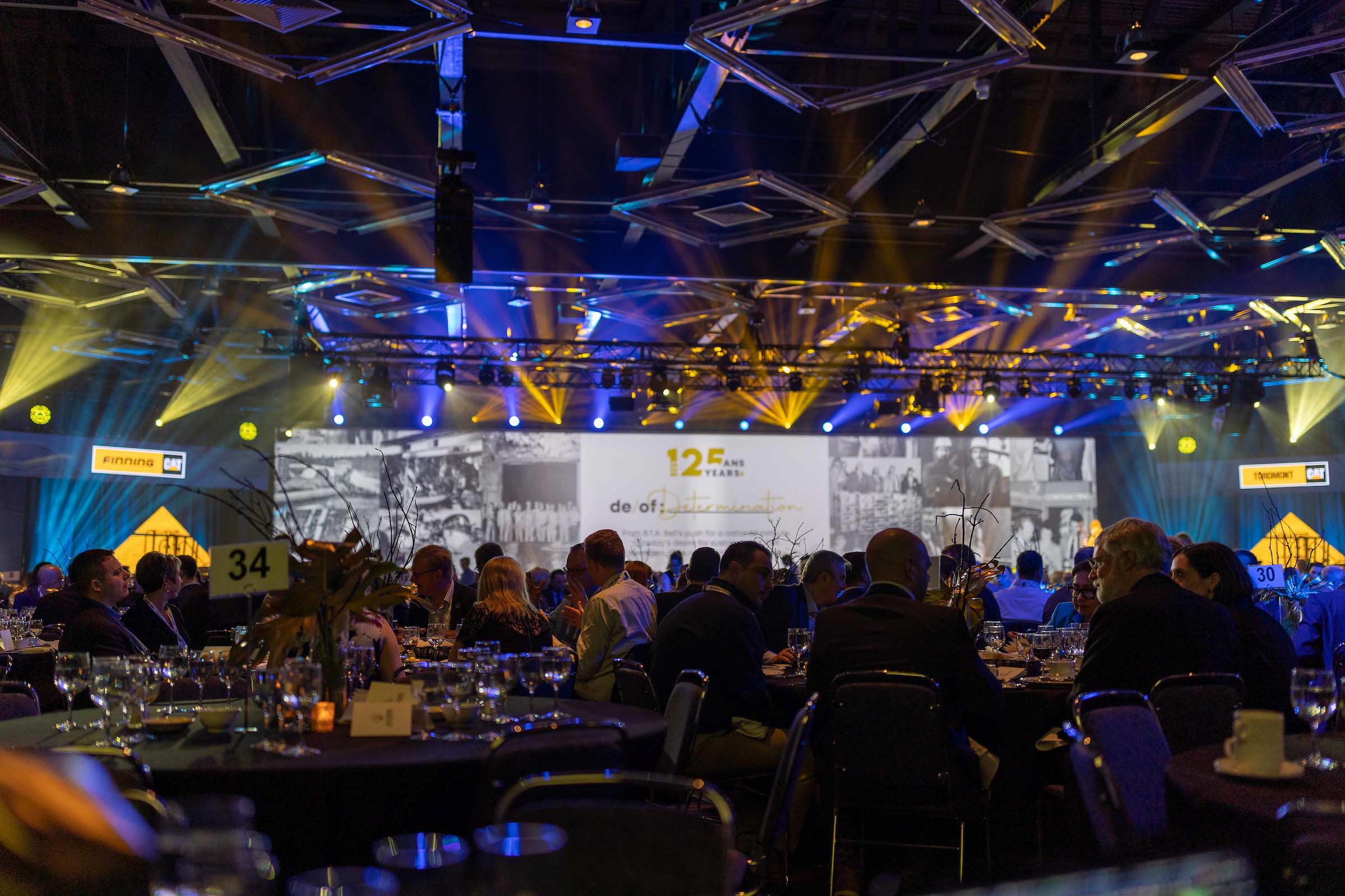 A picture of MTL23's Gala event displaying visuals on screen