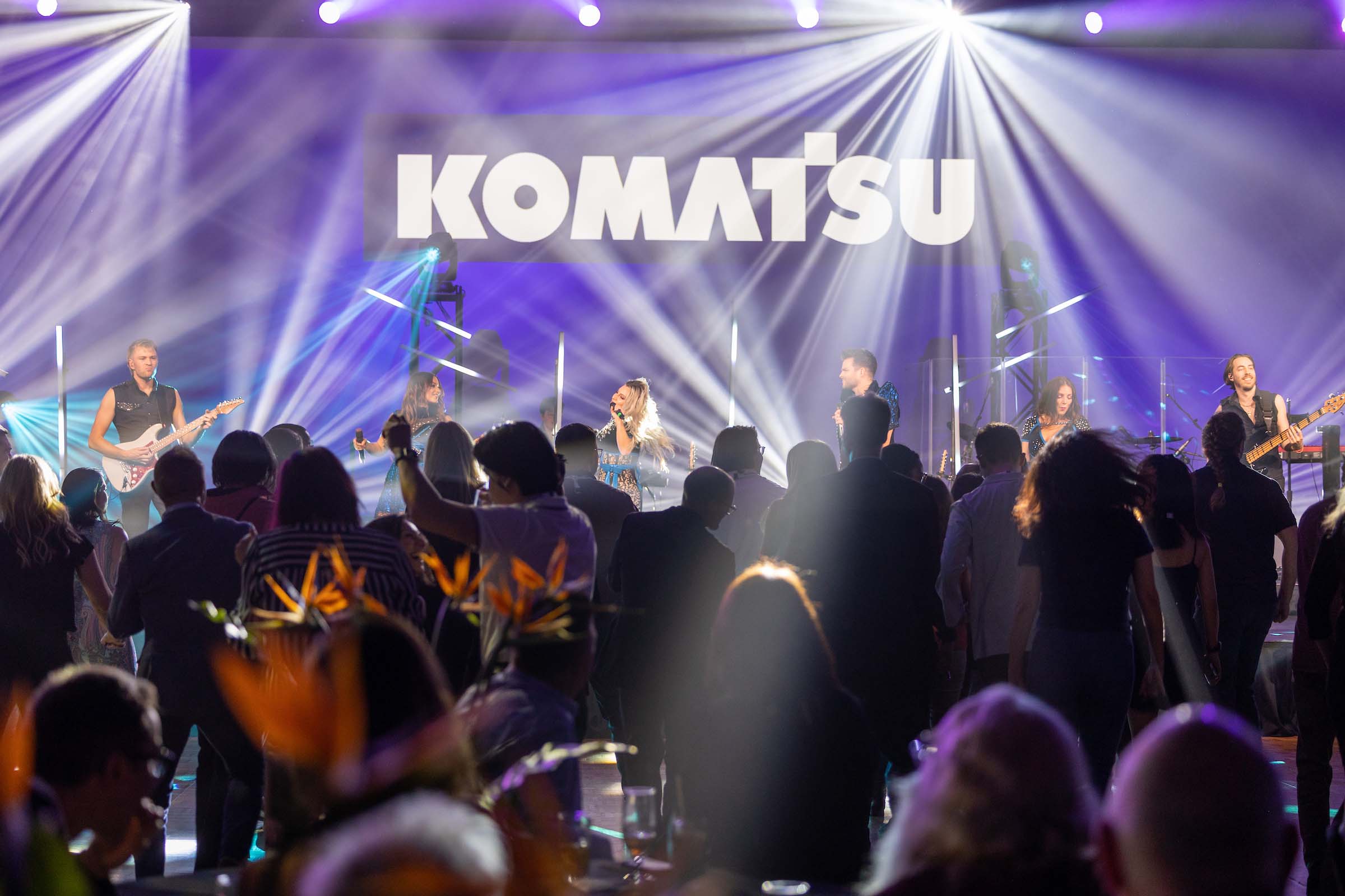 A picture of MTL23's Komatsu Gala event displaying visuals on screen